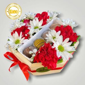 Arreglo con claveles margaritas y chocolates